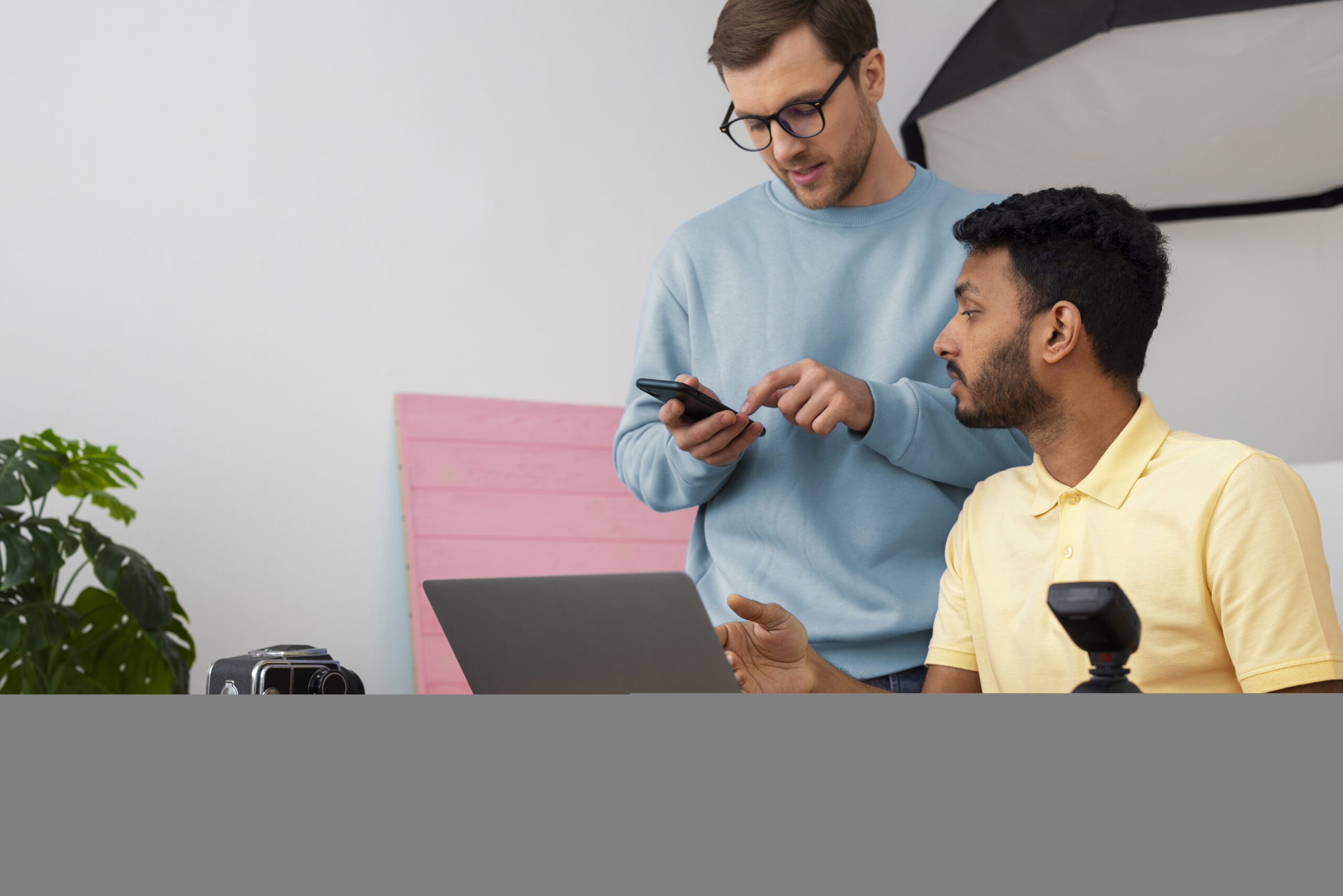 medium shot specialized photographers working studio