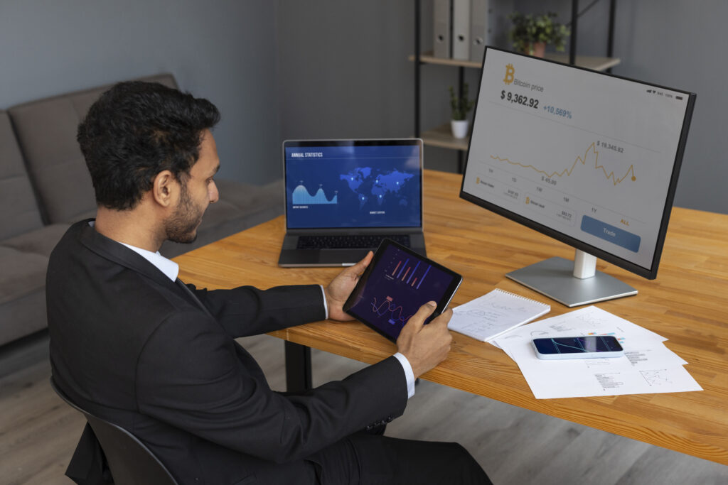 business person looking finance graphs